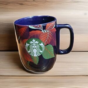 Starbucks Christmas Poinsettia Indigo Blue Ceramic Coffee Mug 12 Oz Holiday Cup